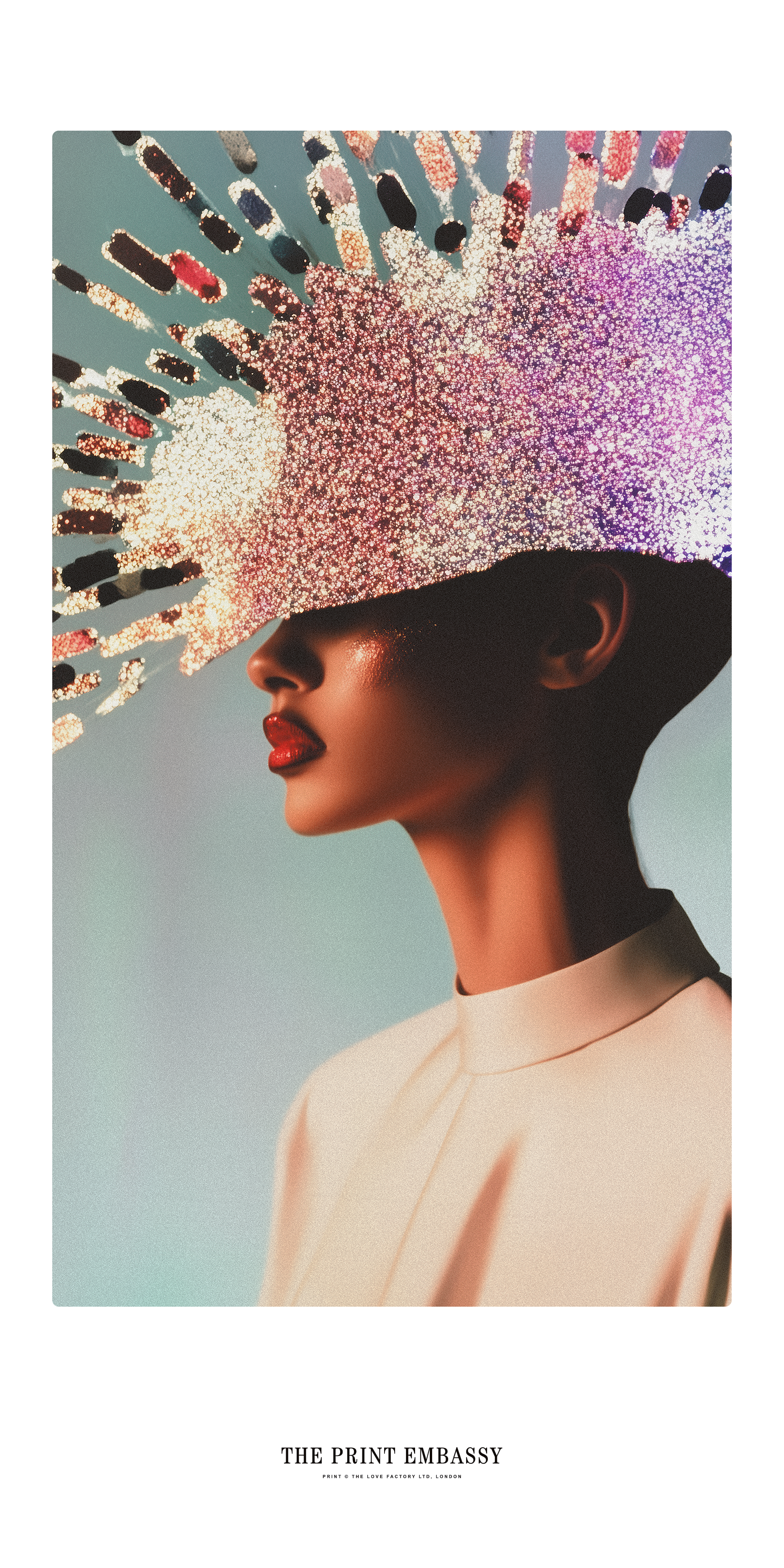 A lady with red lipstic, and a white satin top with a colorful glitter-covered headdress. 'The Print Embassy' branding is below the artwork. The print is oversized and really makes a statement.