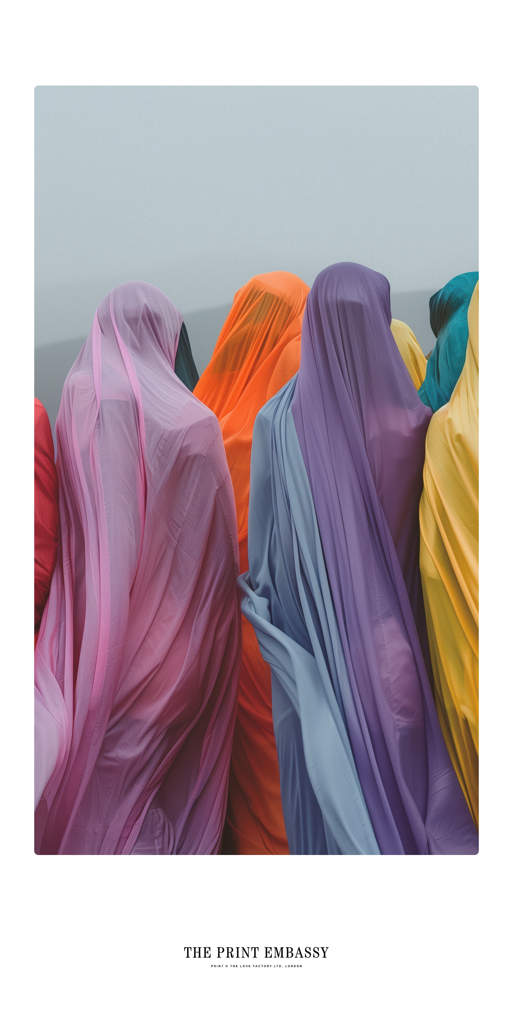A group of people facing away from the camera wearing very colorful burqas. They are looking out towards a beautiful foggy and hilly expanse. The large unframed print is by The Print Embassy.