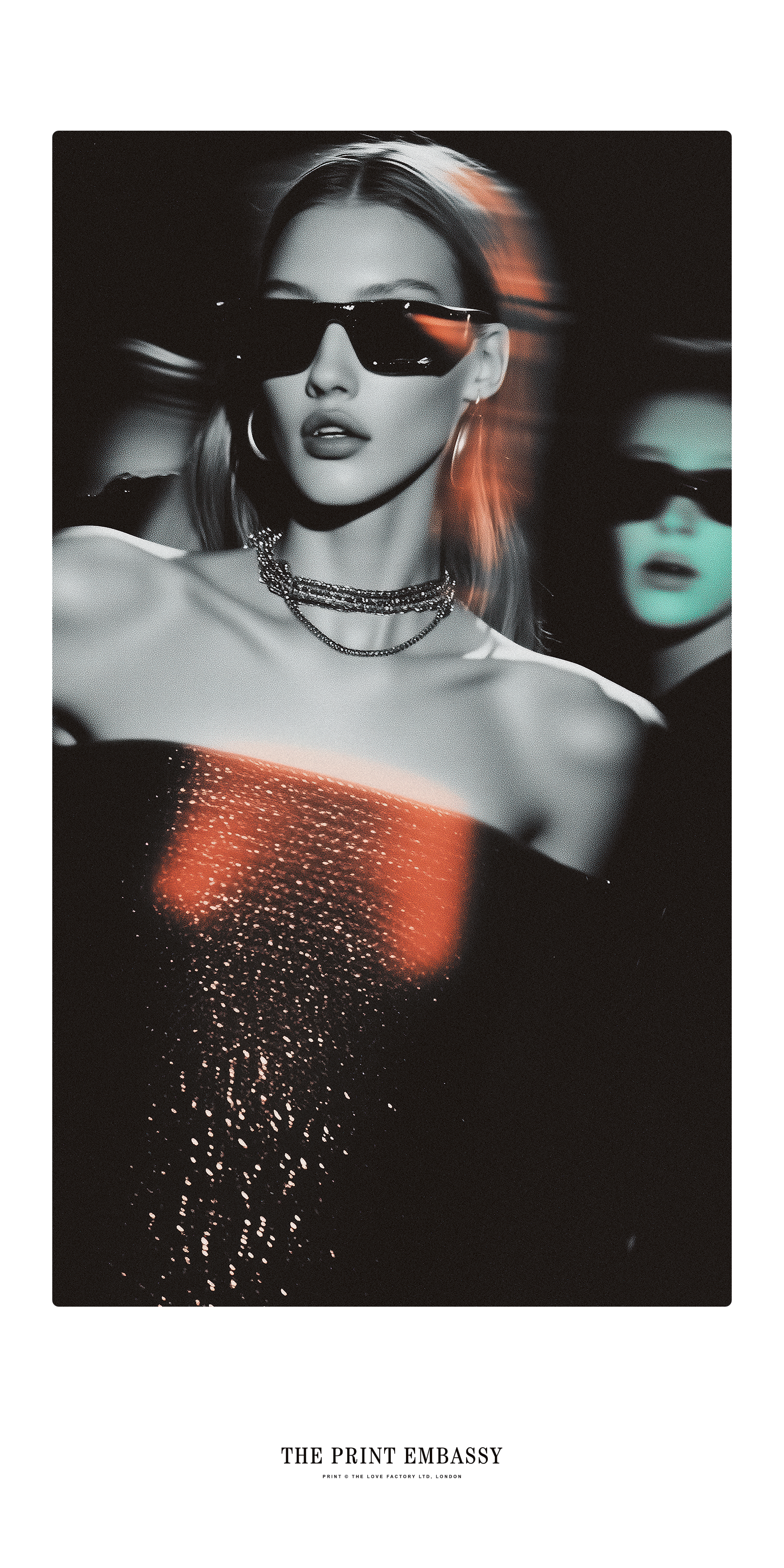Model wearing sunglasses and a black outfit with red accents, with 'The Print Embassy' branding.