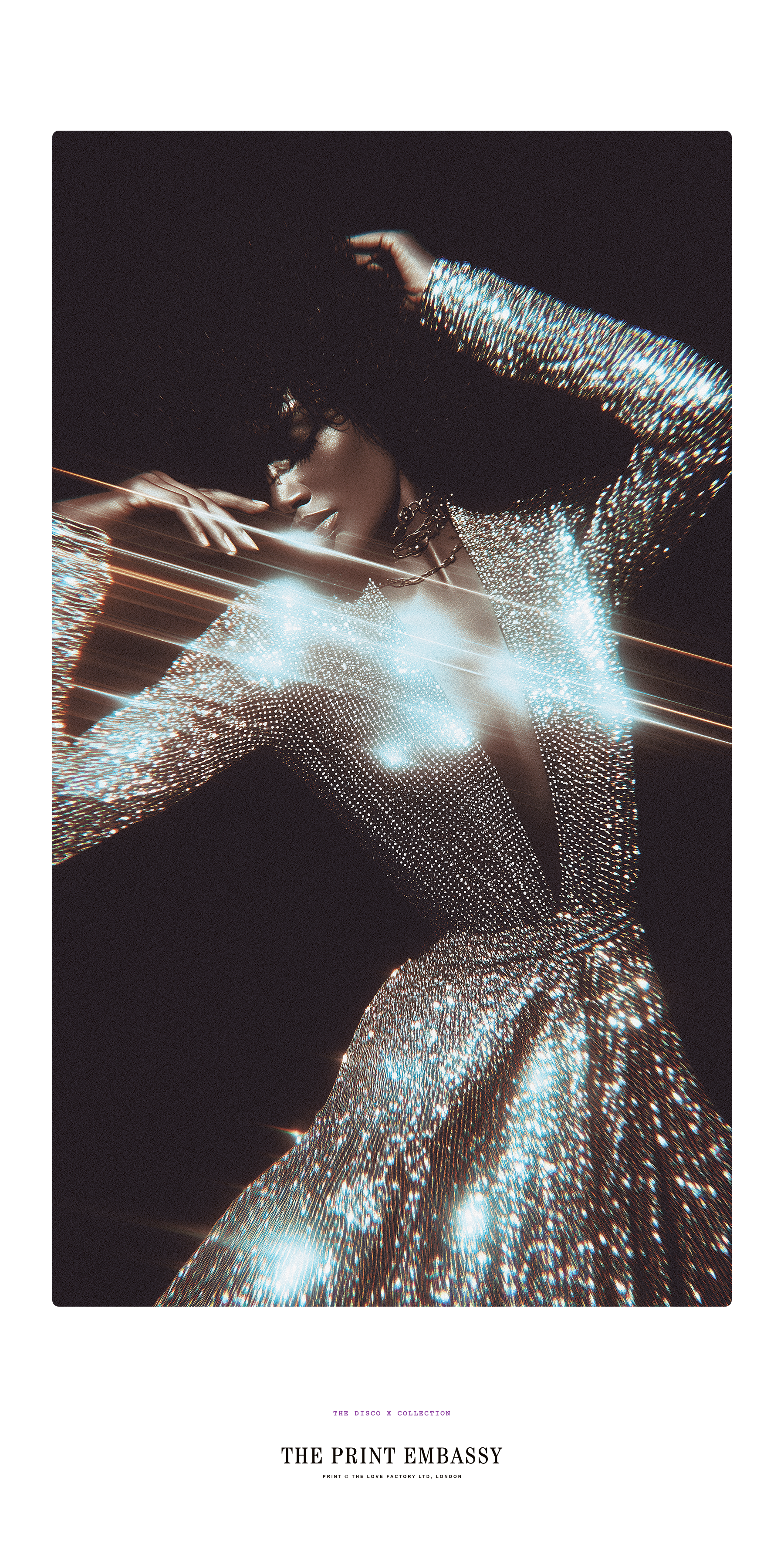 Person in a sparkling outfit with light effects against a dark background, featuring 'The Print Embassy' brand. Taken frorm their oversized Disco X Print Collection