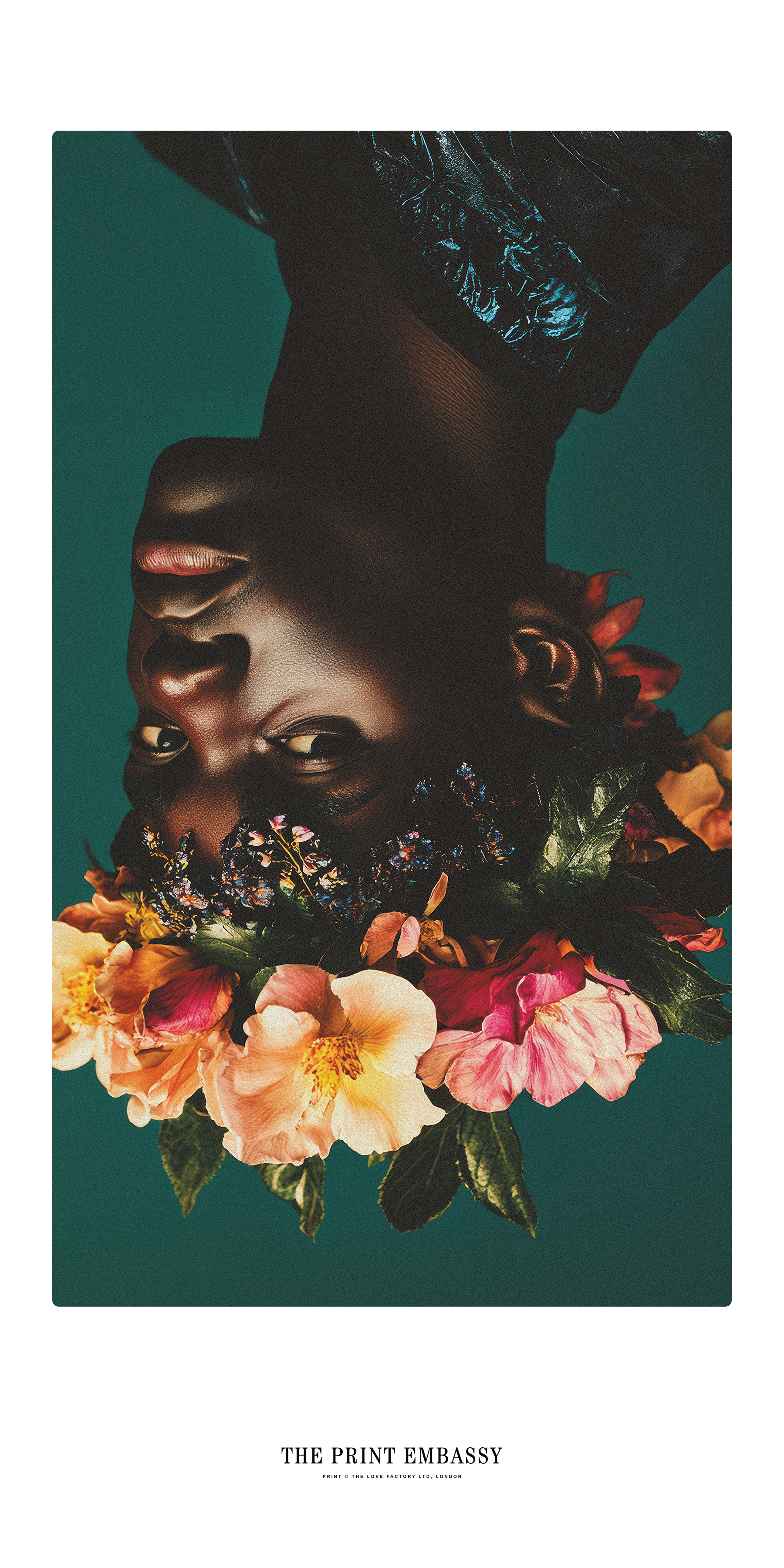 Artistic depiction of an upside down face with flowers and a teal background, featuring 'The Print Embassy' branding.