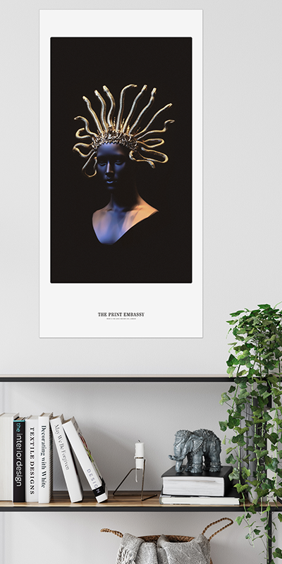 Framed artwork of a person wearing a gold headpiece on a black background, displayed on a wall above a shelf with books and decor.